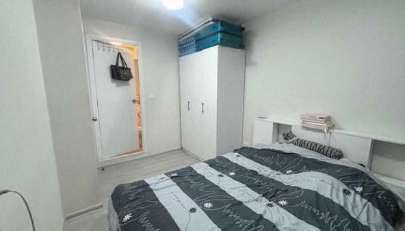 bedroom of PLUM CONDO ราม 60 อินเตอร์เชนจ์