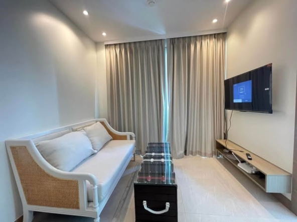 bedroom and living room of The Riviera Ocean Drive