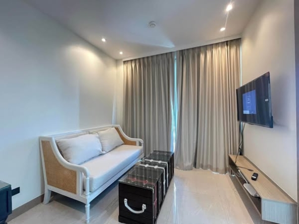 bedroom and living room of The Riviera Ocean Drive
