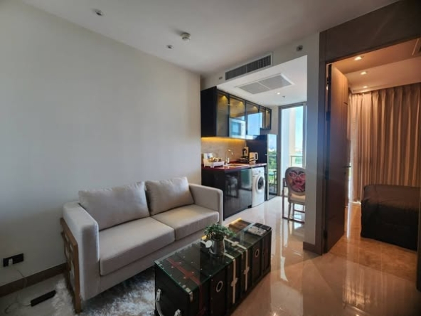 living room and bedroom of The Riviera Ocean Drive
