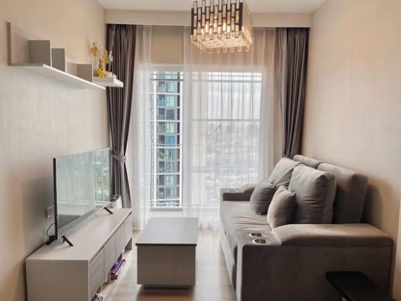 living room and bedroom of Amber Condominium By Eastern Star