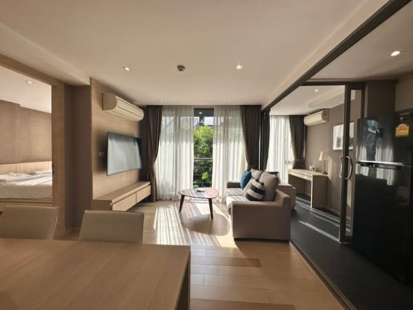 living room and bedroom of Klass Silom Condo