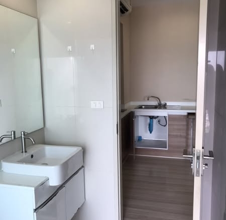 room interior and bathroom of The Hotel Serviced Condo เดอะโฮเทล คอนโด