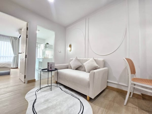living room and bedroom of The Kith Plus Nawamin เดอะ คิทท์ พลัส นวมินทร์