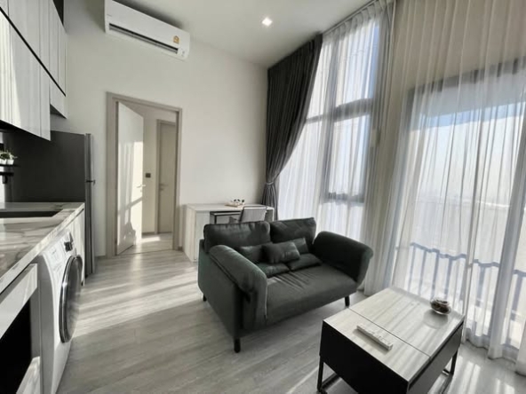 living room and bedroom of THE LINE Sukhumvit 101