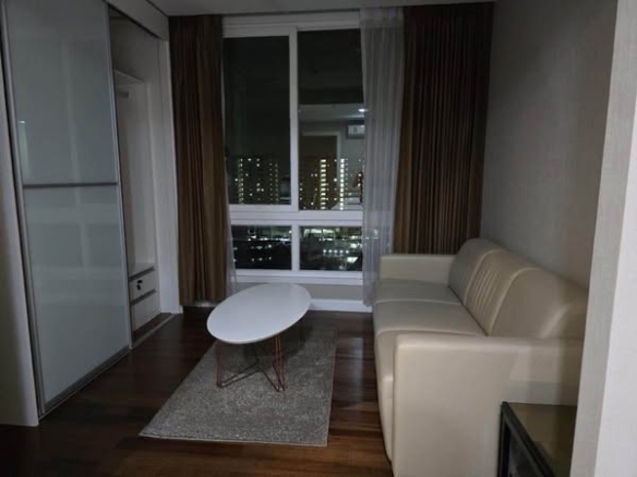 living room and bedroom of The Metropolis Samrong