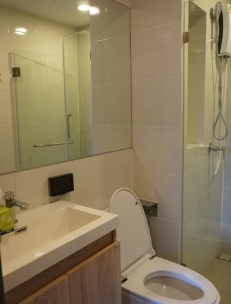 room interior and bathroom of The Origin Ratchada-Lat Phrao