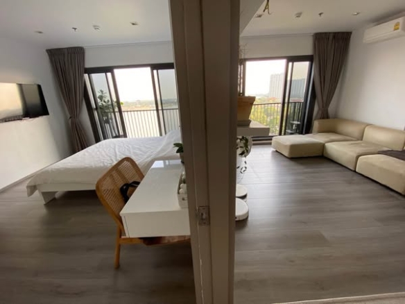 living room and bedroom of The Politan Aqua