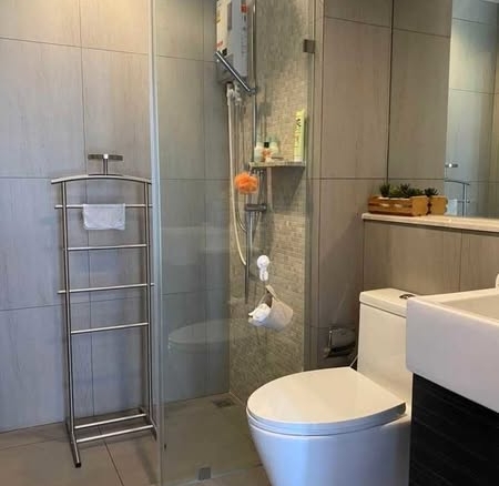 room interior and bathroom of The Politan Rive