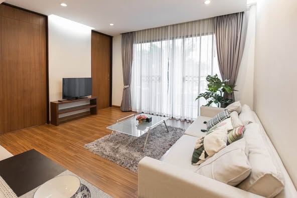 living room and bedroom of The Resort Condominium