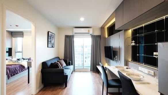 bedroom and living room of The Selected Kaset-Ngamwongwan by LPN