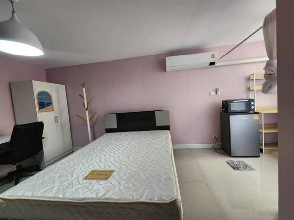 bedroom of 103 Condominium