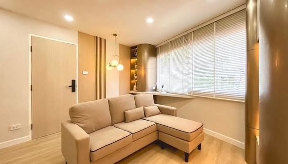 bedroom and living room and room interior of 103 Condominium