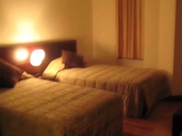 bedroom of All Seasons Mansion