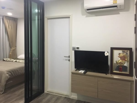 bedroom and room interior of Brown Condo HuaiKwang