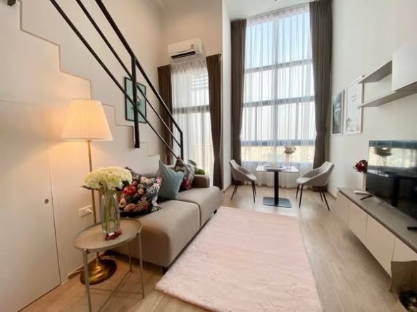 living room and bedroom of IDEO Rama9 – Asoke