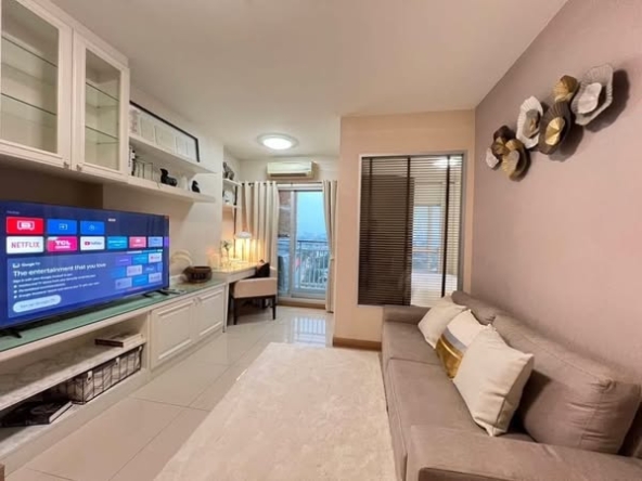 living room and bedroom of IVY River Condo