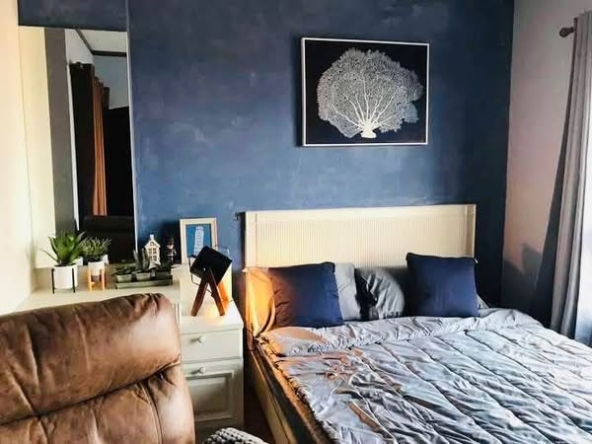 living room and bedroom of IVY River Condo