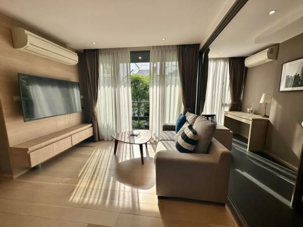 living room and bedroom of Klass Silom Condo