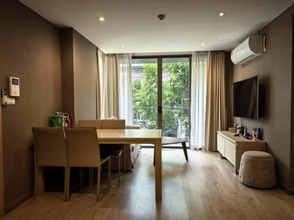 living room and bedroom of Klass Silom Condo