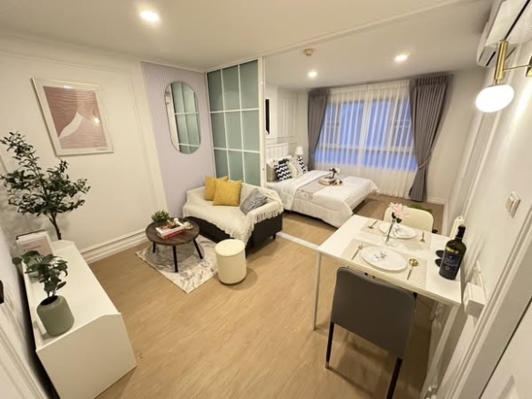 bedroom and living room of Lumpini Ville Ramkhamhaeng 26
