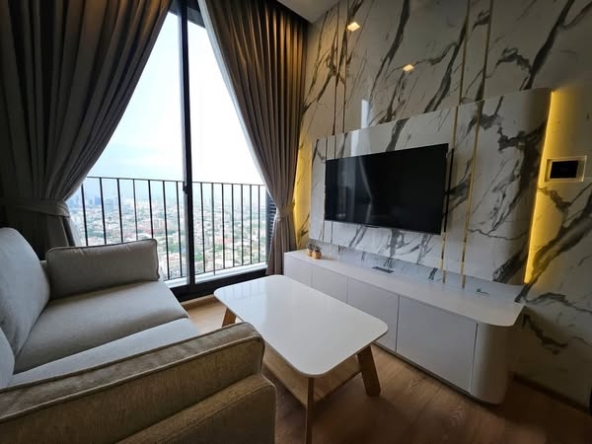 living room and bedroom of Noble Around Ari