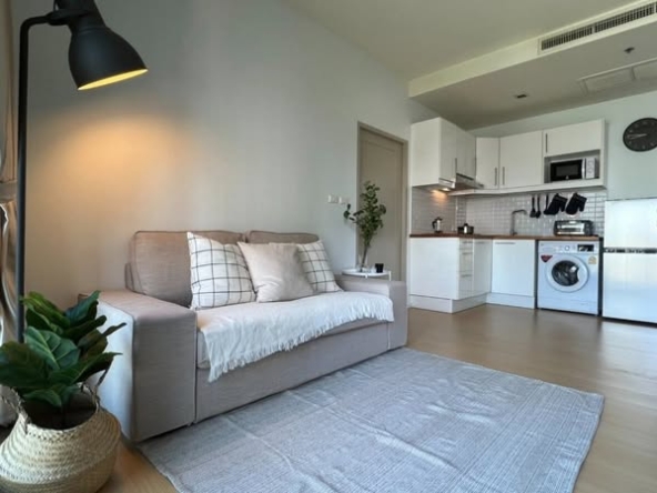 bedroom and living room of Noble Reveal