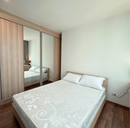 bedroom of Noble Revolve Ratchada 2