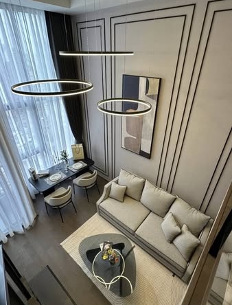 living room and bedroom of Park Origin Chula-Sam Yan