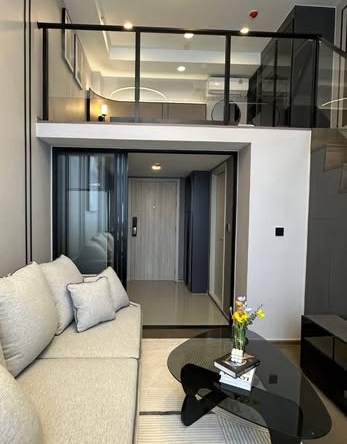 living room and bedroom of Park Origin Chula-Sam Yan