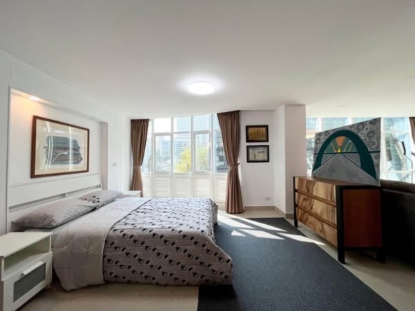 bedroom of Prime Suites Condominium