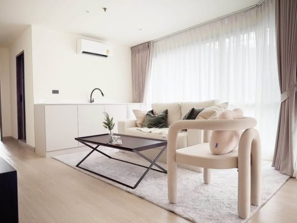 bedroom and living room of Sukhumvit Suites Hotel
