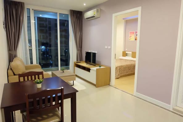 living room and bedroom of TC-Green Condominium