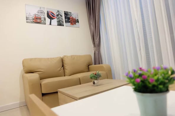 living room and bedroom of TC-Green Condominium