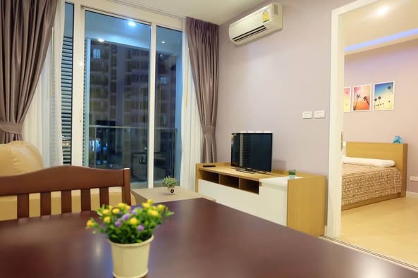 living room and bedroom of TC-Green Condominium