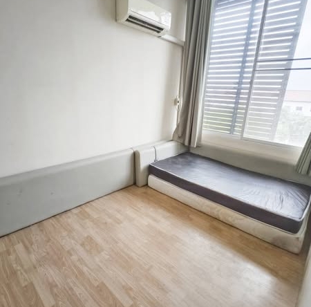 bedroom of The Attic Townhome