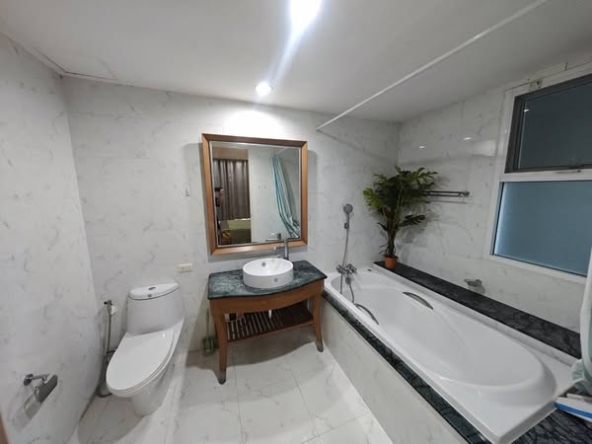 bedroom and bathroom of The Bangkok Sukhumvit 61