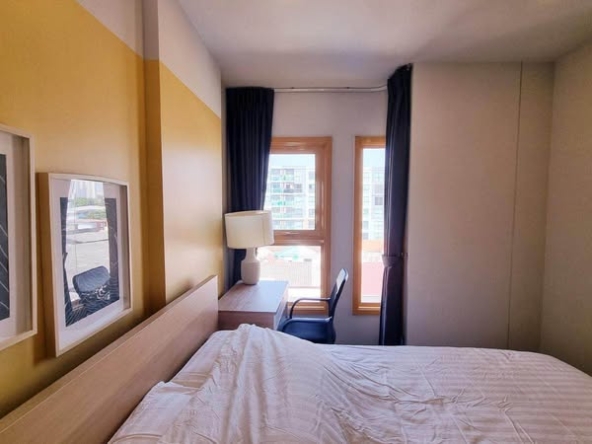 bedroom of THE BASE Sukhumvit 50