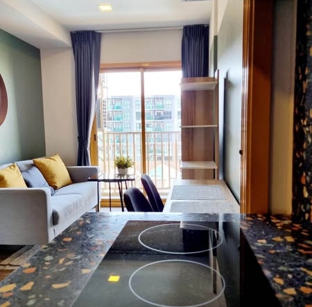 living room of THE BASE Sukhumvit 50