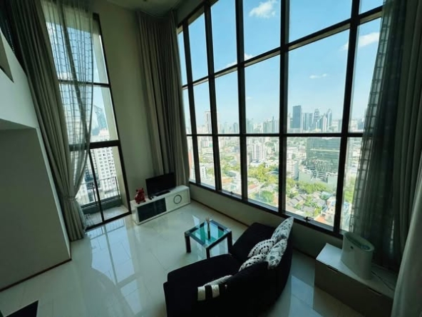 living room and bedroom of The Emporio Place