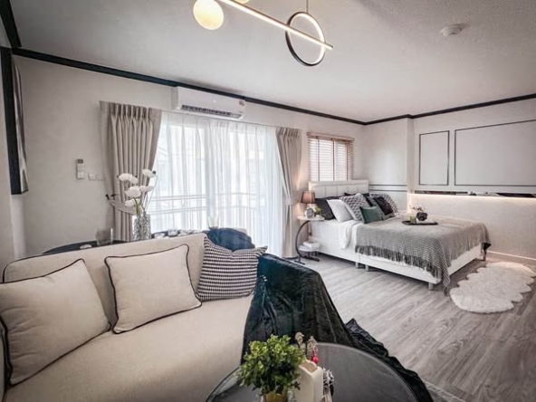 living room and bedroom of The Escape Condominium – ดิ เอสเคป คอนโดมิเนียม