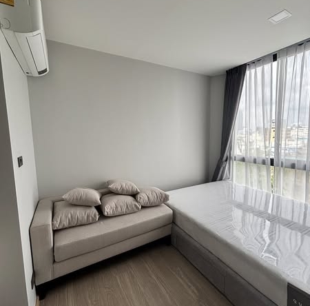 bedroom of The Moment Ratchada 19