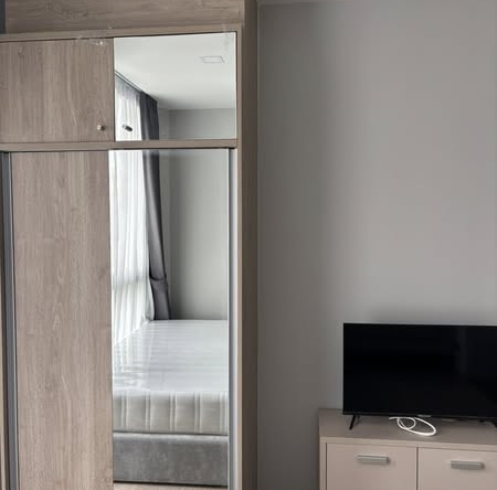 bedroom and room interior of The Moment Ratchada 19