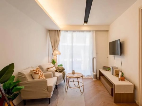 bedroom and living room of The Nest Ploenchit