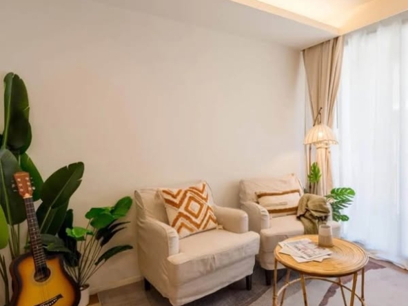 bedroom and living room of The Nest Ploenchit