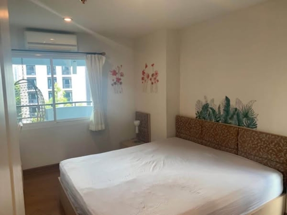 bedroom of The Next Garden Suites