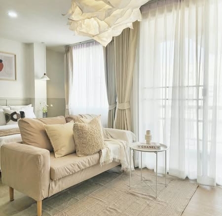 living room and bedroom of The Parkland Bangna