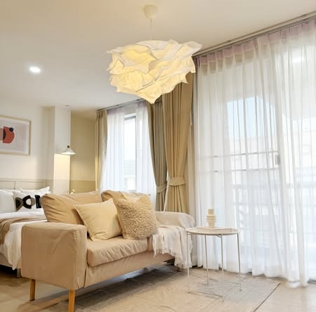 living room and bedroom of The Parkland Bangna