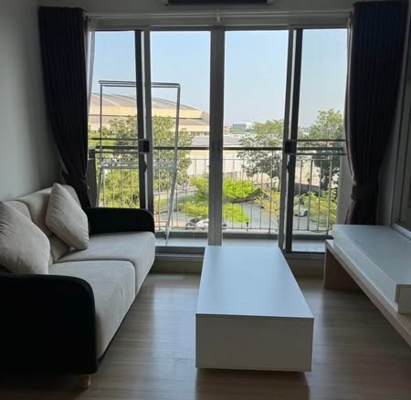 living room and bedroom of The Parkland Srinakarin Lakeside