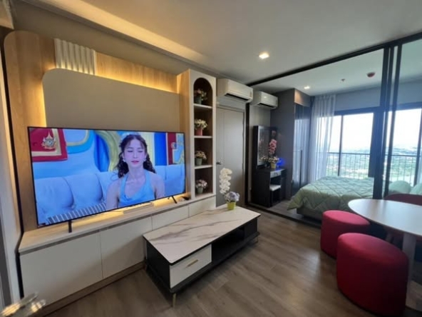 living room and bedroom of The Politan Aqua